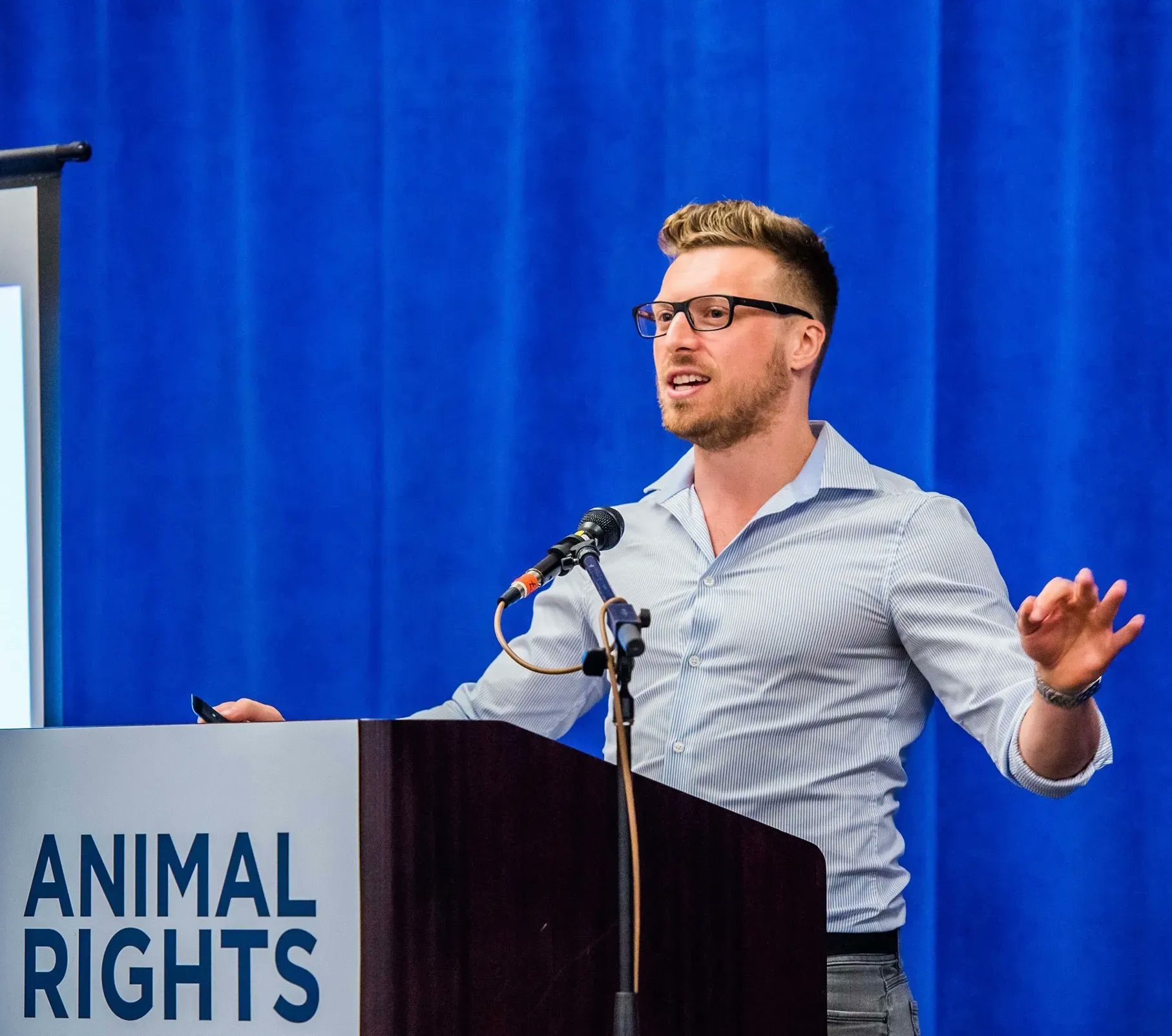John Oberg speaking at an event in support of the animals.